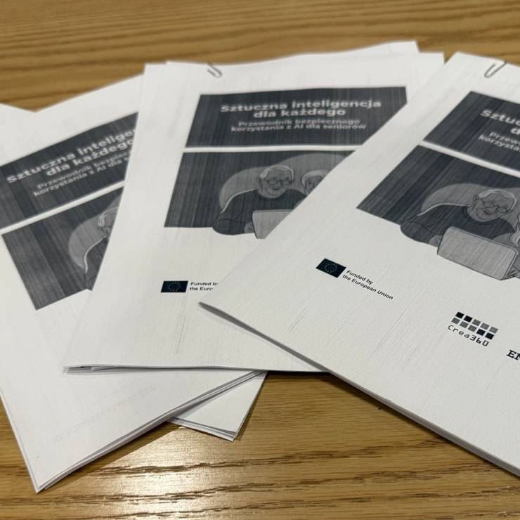 Workshop participants collaborating on AI project