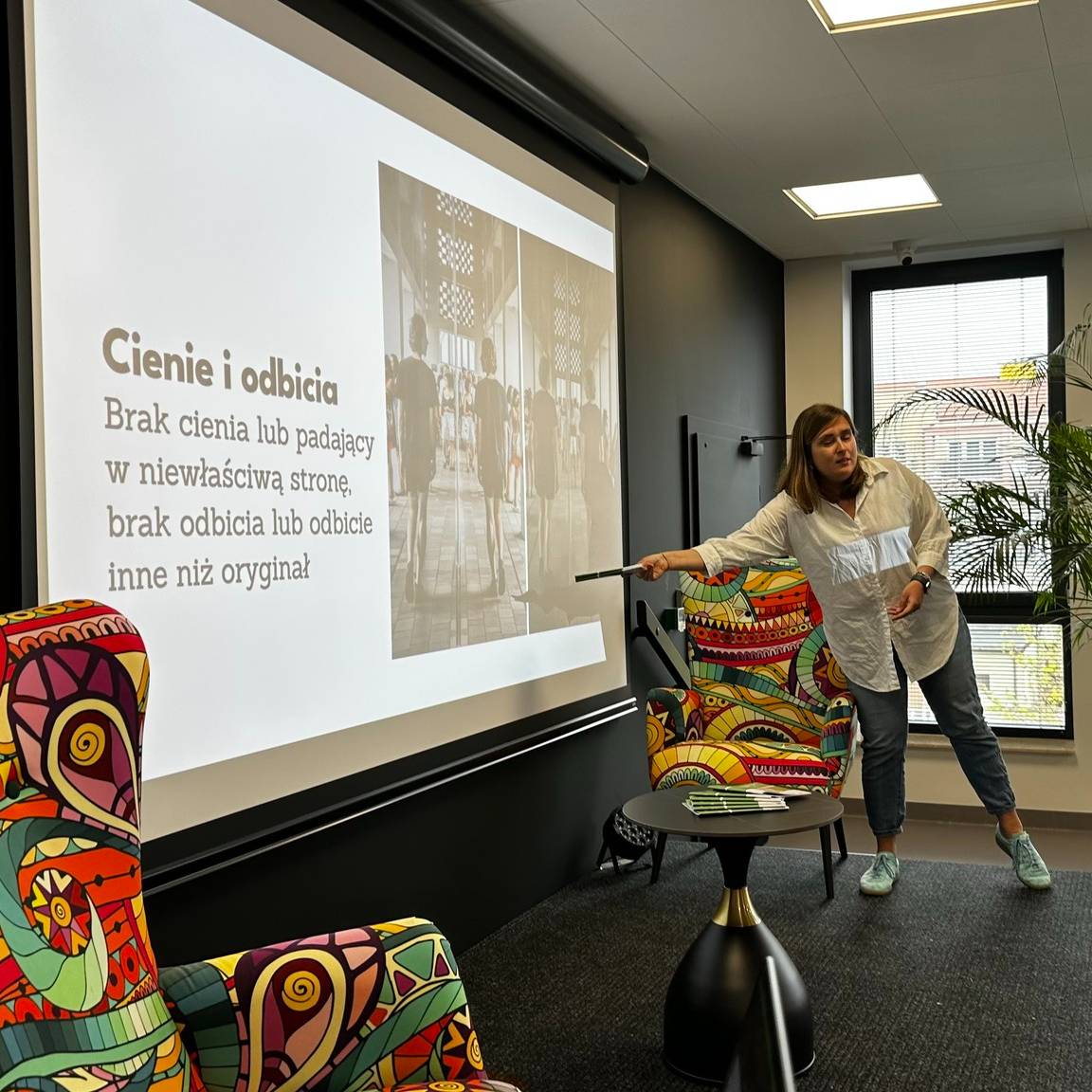 Senior practicing AI tools with trainer